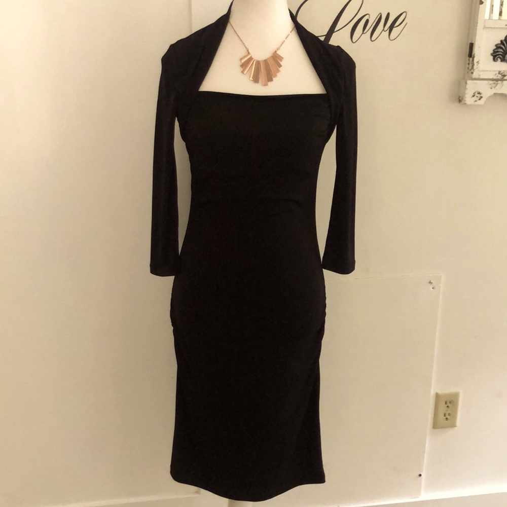 Long sleeve black curve hugging dress